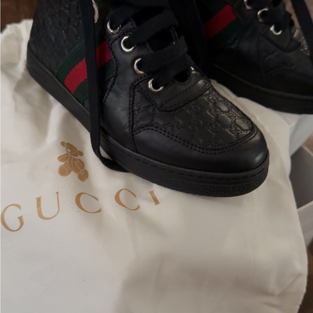 Gucci Embossed Black Sneakers with Signature Stripe